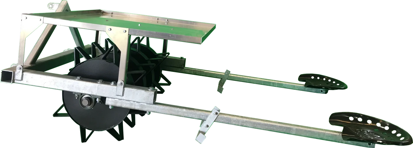 The Velocity PL-22 garlic planter: a galvanised steel frame with a green seed tray, spiked planting wheels, and two rails running back to a pair of operator seats.